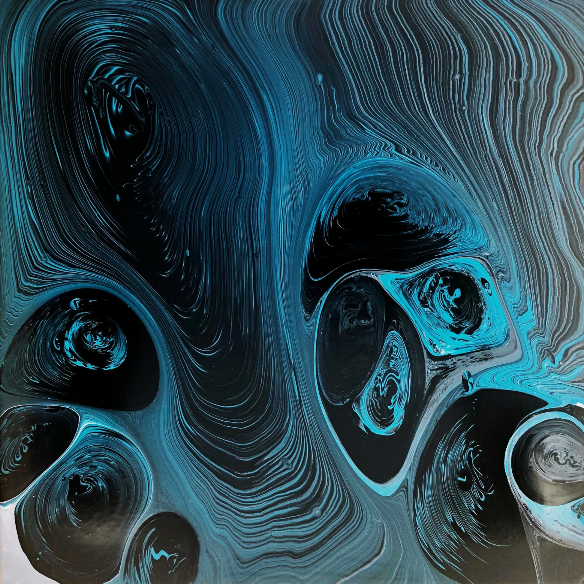 Abstract painting with turquoise and blue fluid lines on a dark background, forming wave-like, hypnotic swirling shapes.
